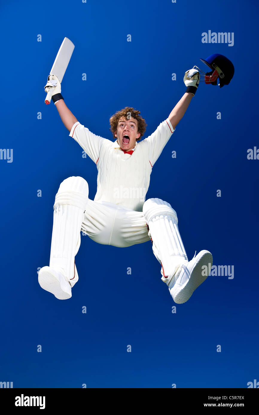 Un cricketer celebra. Foto Stock
