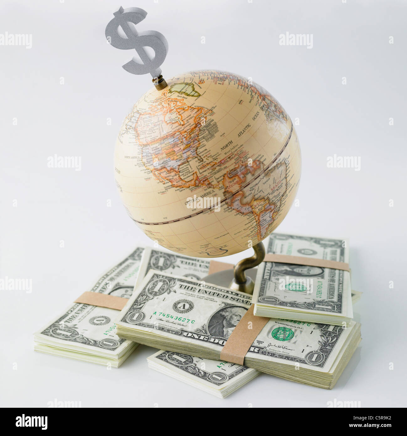 Un globo con carta moneta Foto Stock