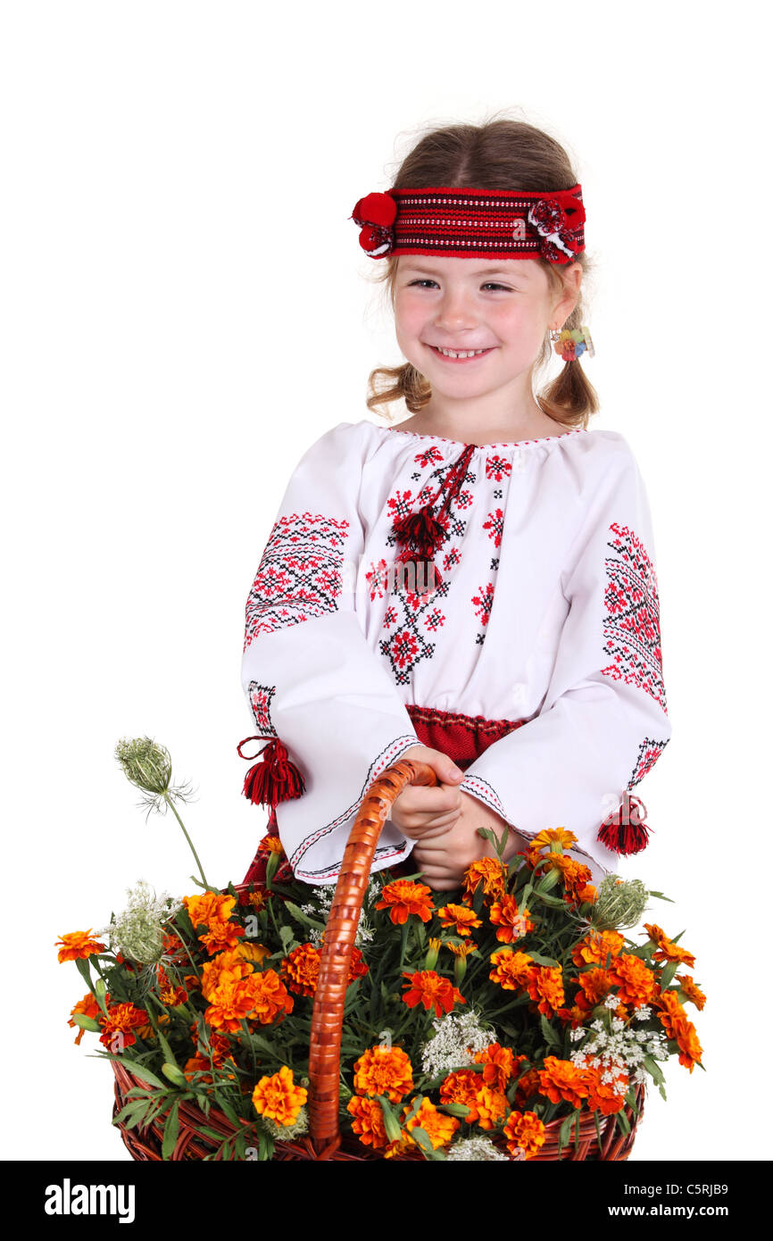 Bambina con il costume tradizionale e Fiore di Acconciatura di primavera al  FESTIVAL DEI FIORI Funchal Madeira Portogallo Foto stock - Alamy