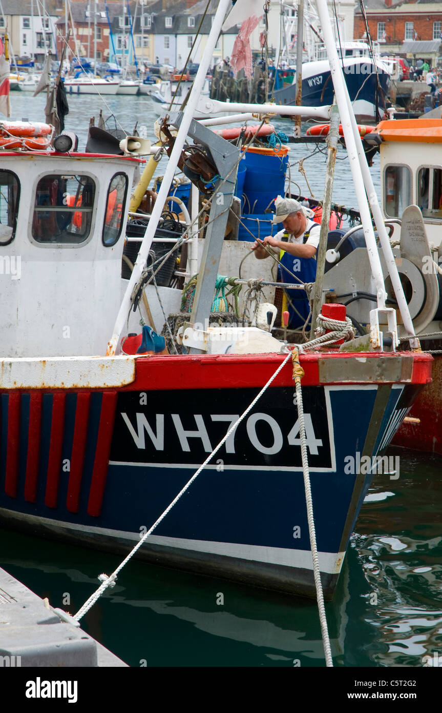 Rammendo delle reti da pesca prima di vela Foto Stock