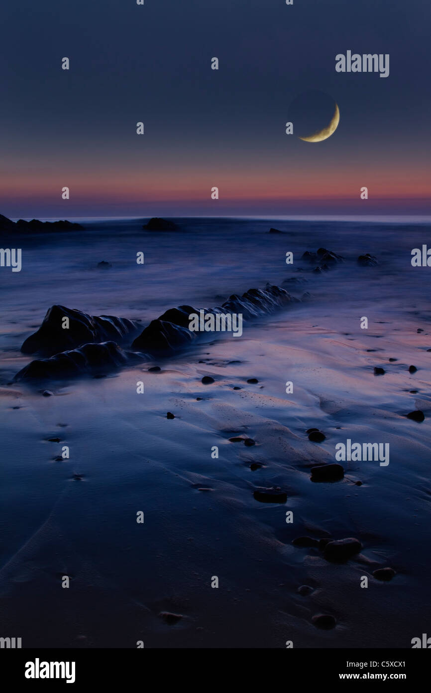 Crepuscolo presso Widemouth Bay in Cornwall Regno Unito Foto Stock