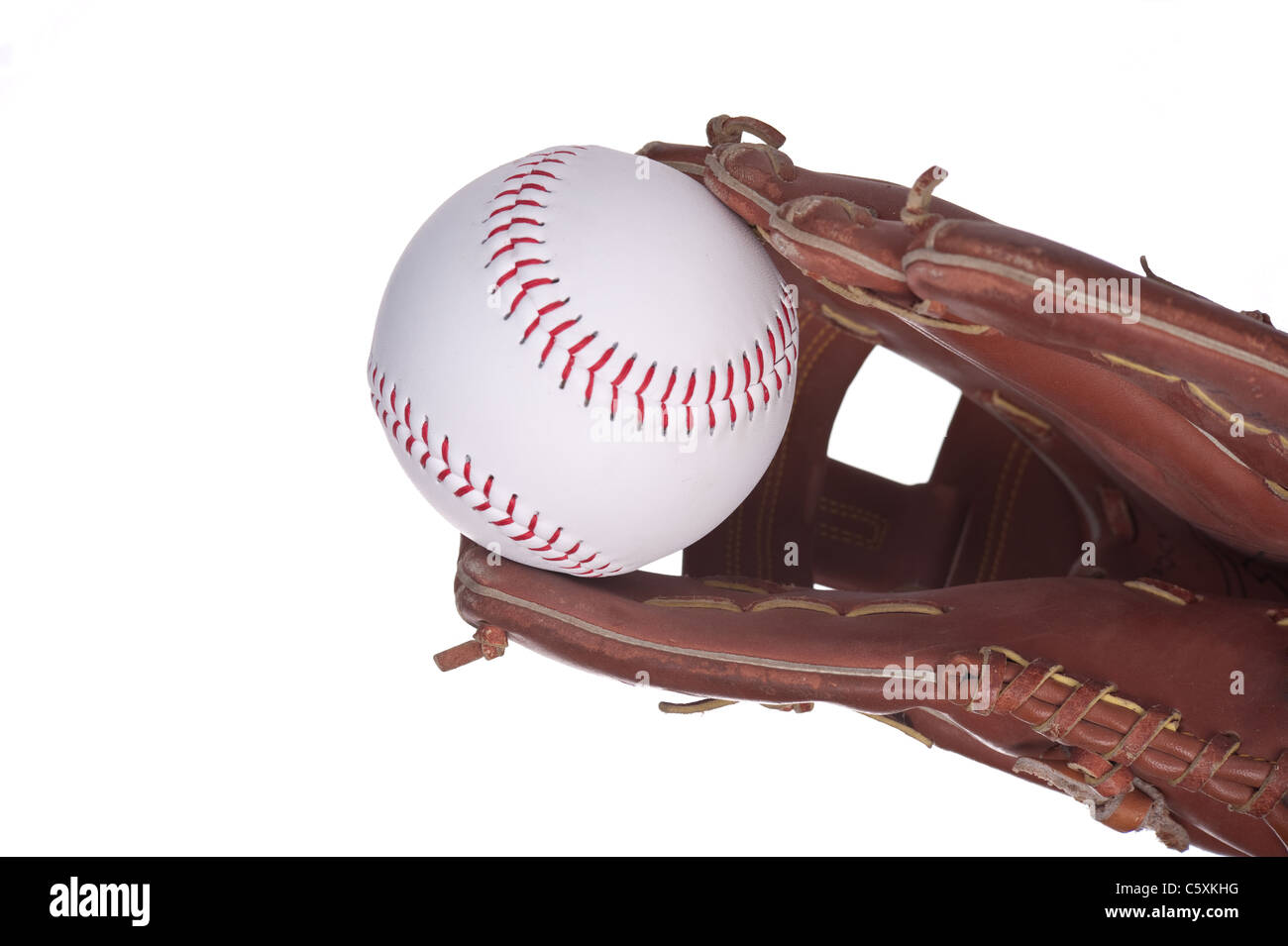 Giocatore di baseball facendo una cattura con il suo guanto Foto Stock