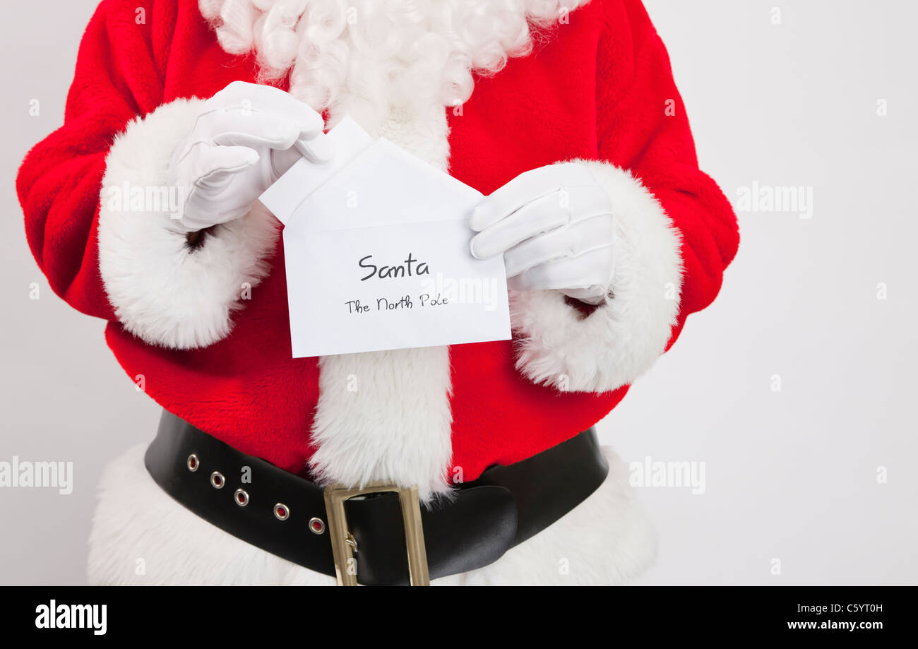 Babbo Natale azienda Lettera di Natale Foto Stock