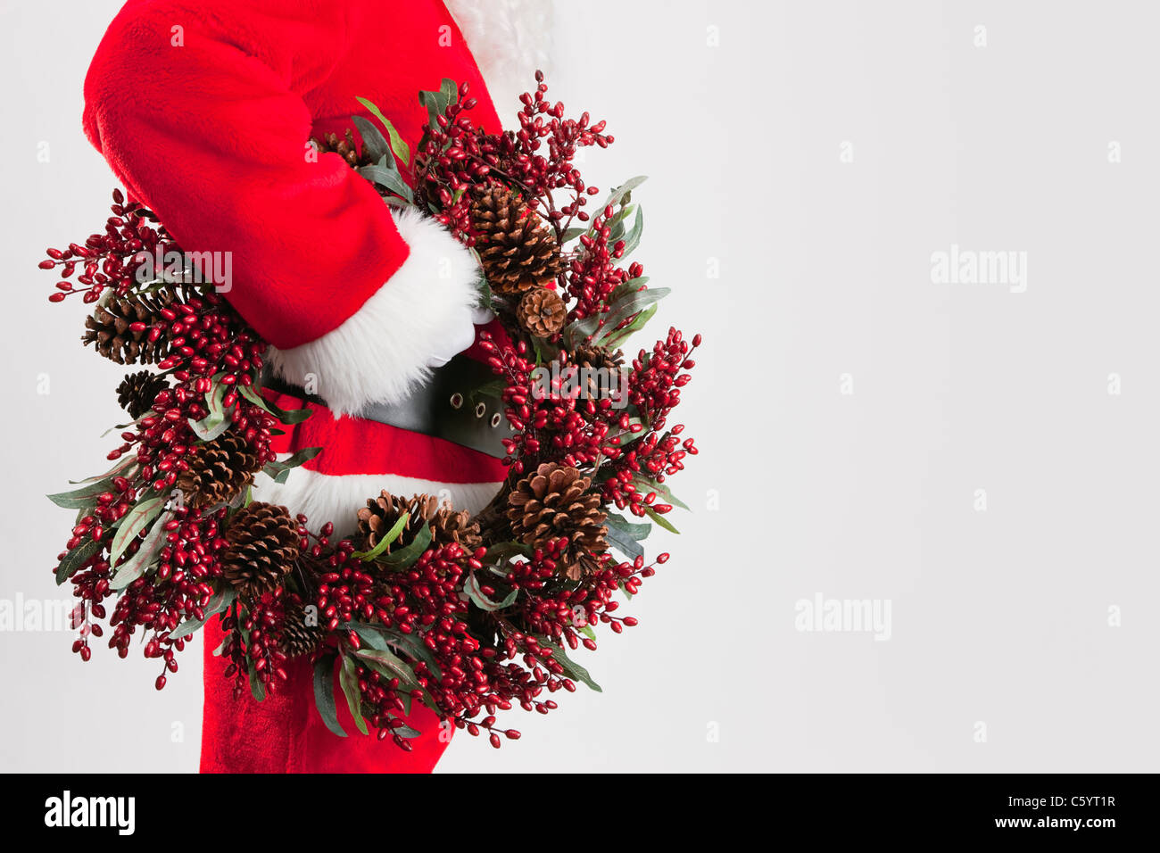 Babbo Natale azienda ghirlanda di Natale Foto Stock