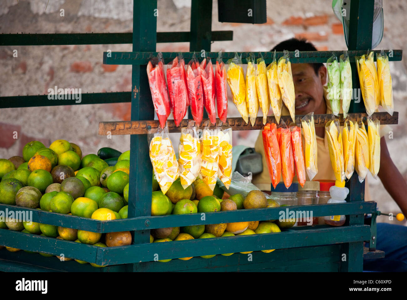 Fornitore di frutta, Antigua, Guatemala Foto Stock