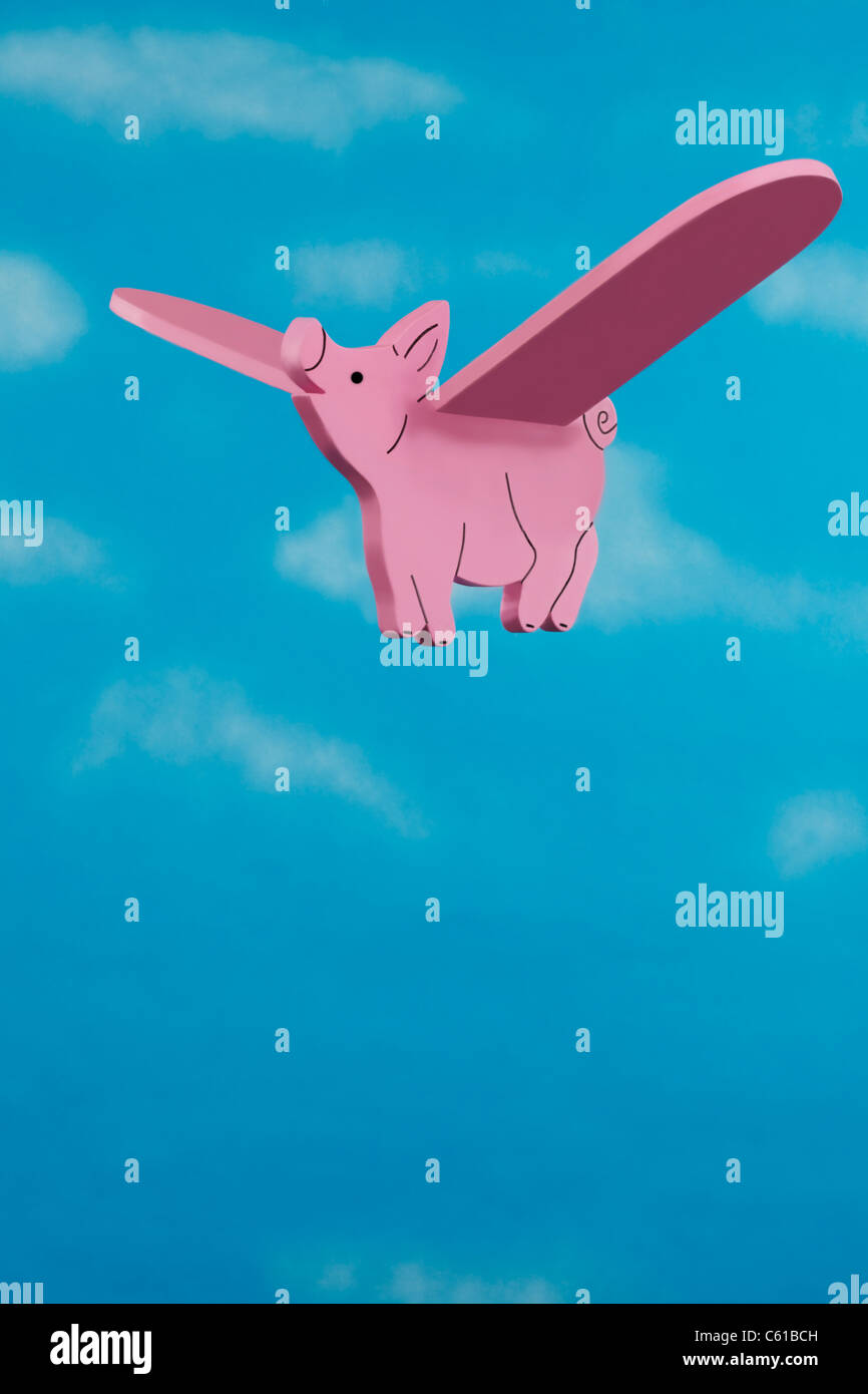 Flying Pig con cielo blu sullo sfondo Foto Stock