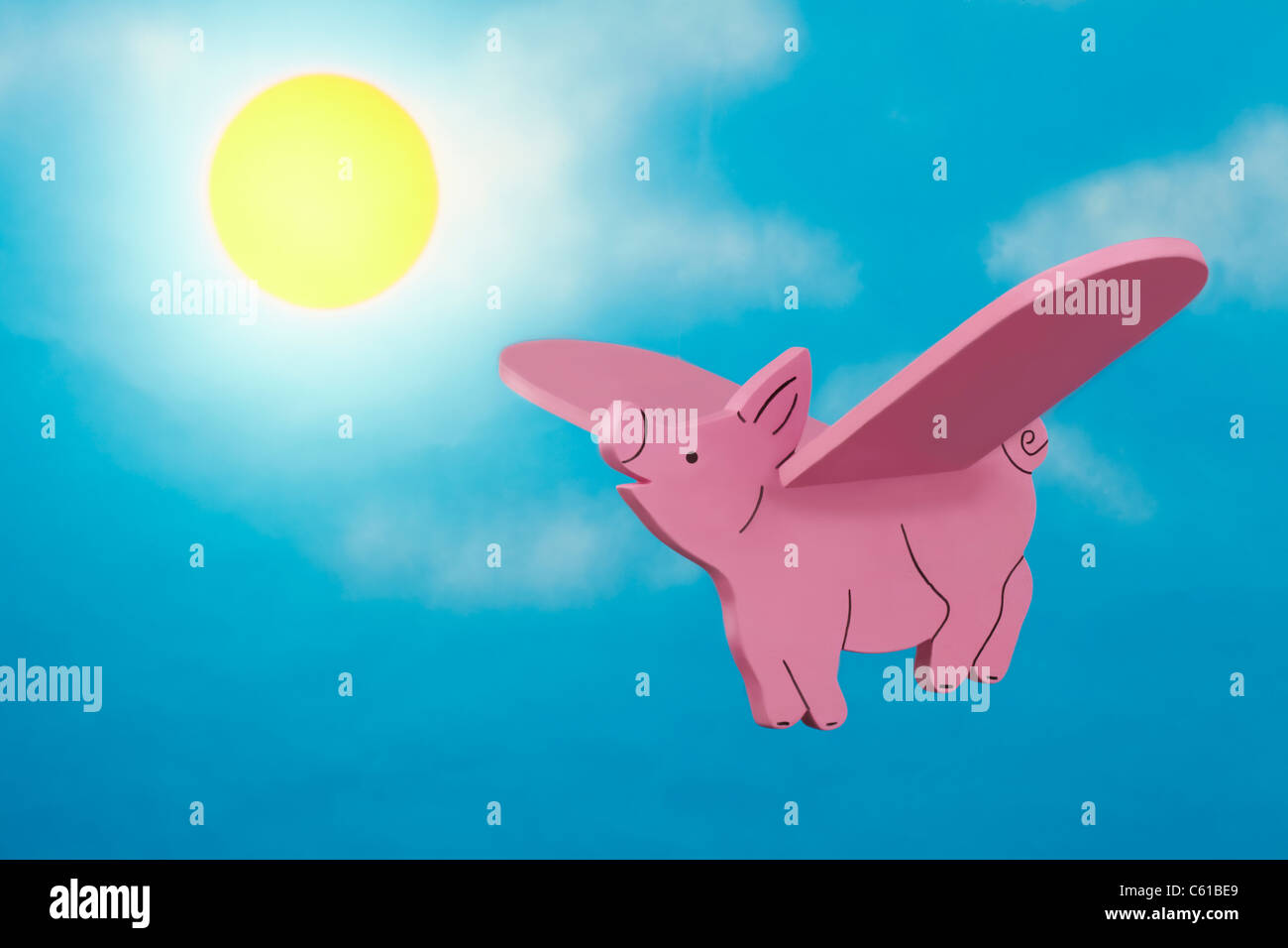 Flying Pig con cielo blu sullo sfondo Foto Stock