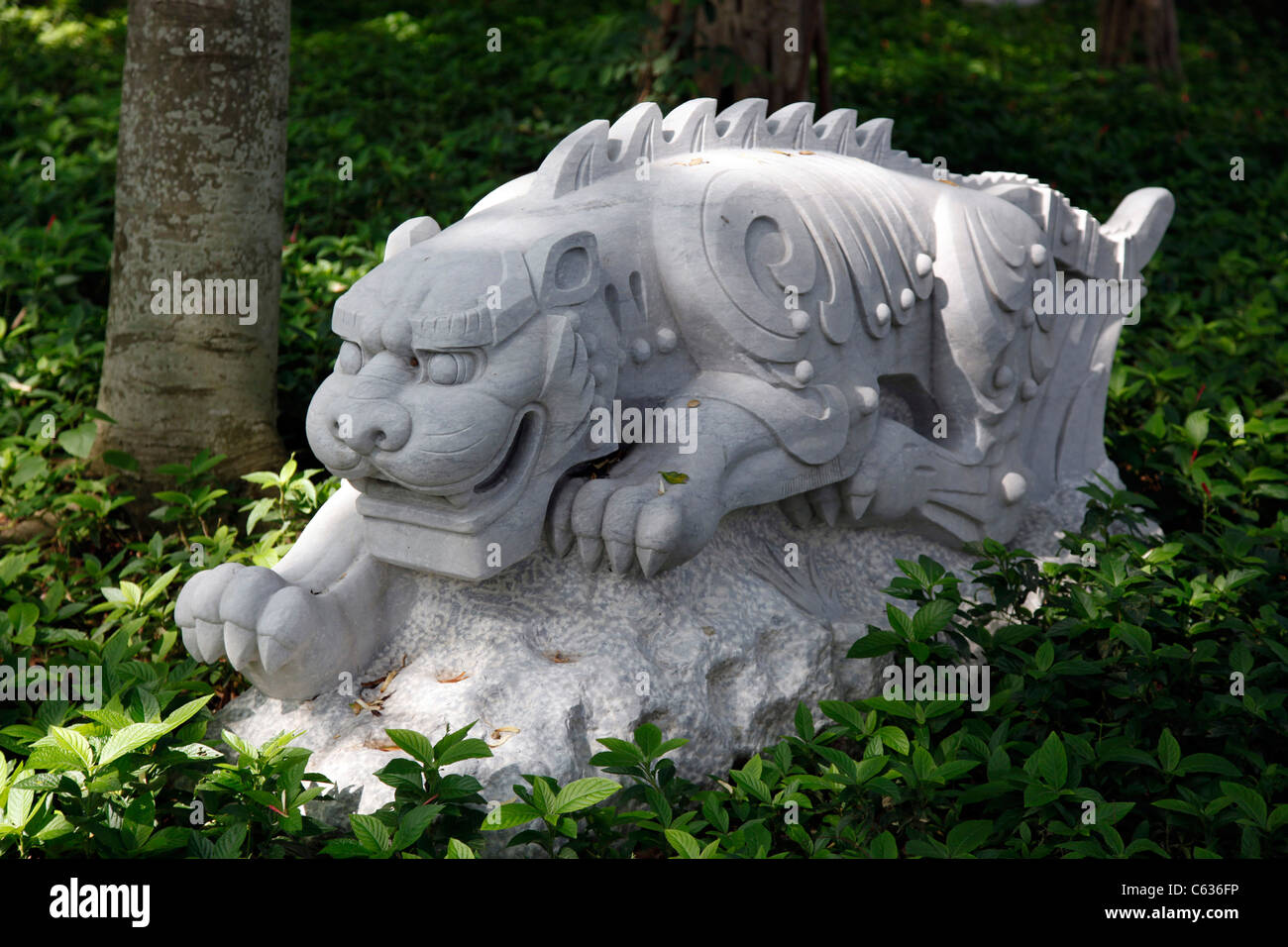 Anno cinese simbolo statue in Kowloon città murata park, tigre, Hong Kong, Cina Foto Stock