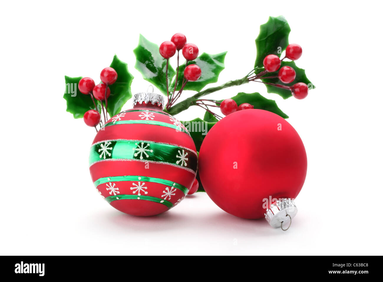 Natale holly con sfere decorative Foto Stock