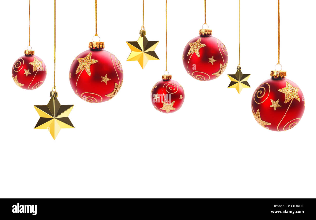 Lucido palle di Natale e stelle d'oro isolato su bianco. Foto Stock