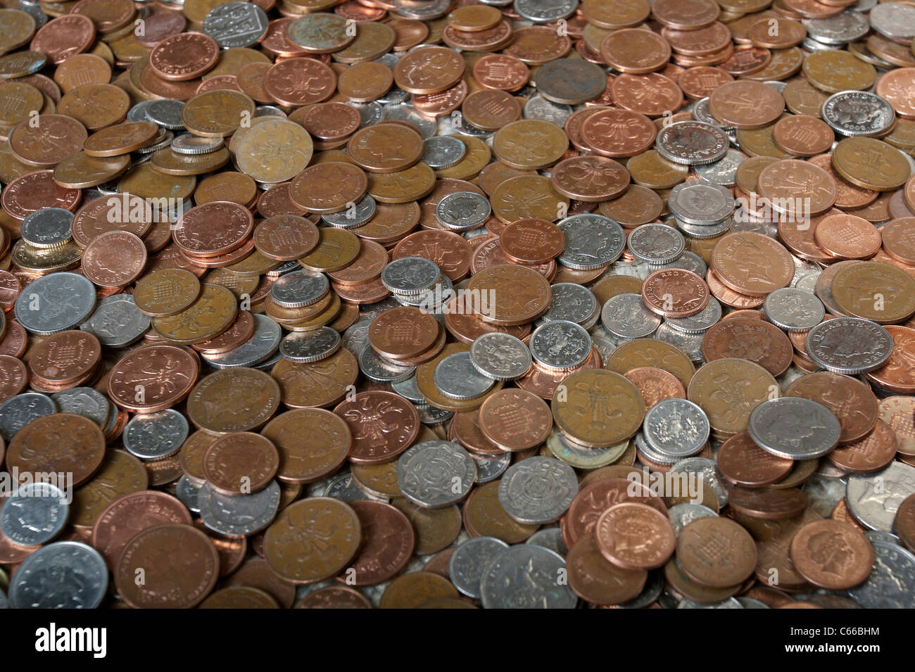 Grande quantità di argento e rame monete Britanniche Foto Stock