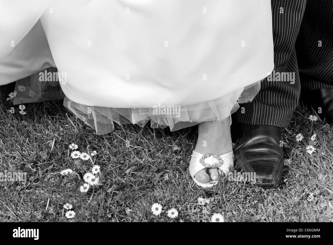 La sposa e lo sposo di nozze di scarpe. Foto Stock