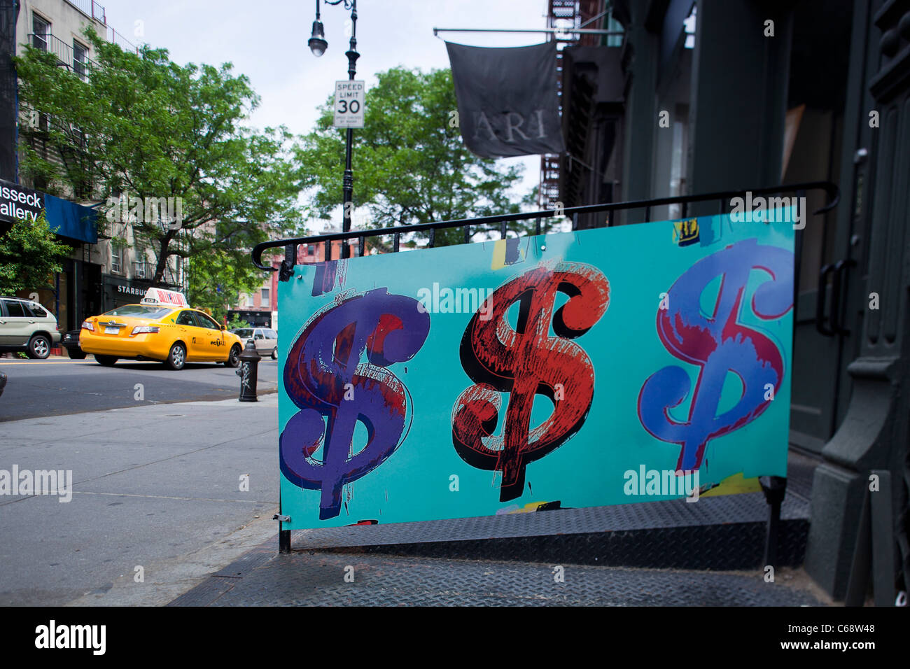 Tre segni di dollaro New York City Foto Stock