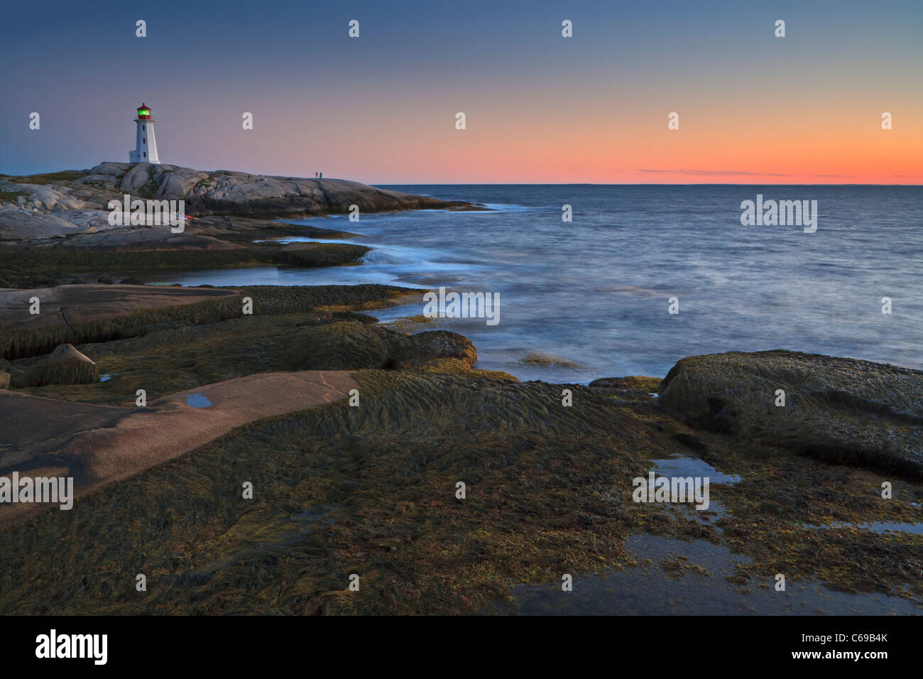 Peggy's Cove Ligthhouse al tramonto, Peggy's Cove, St Margarets Bay, Lighthouse Route, Highway 333, Nova Scotia, Canada. Foto Stock