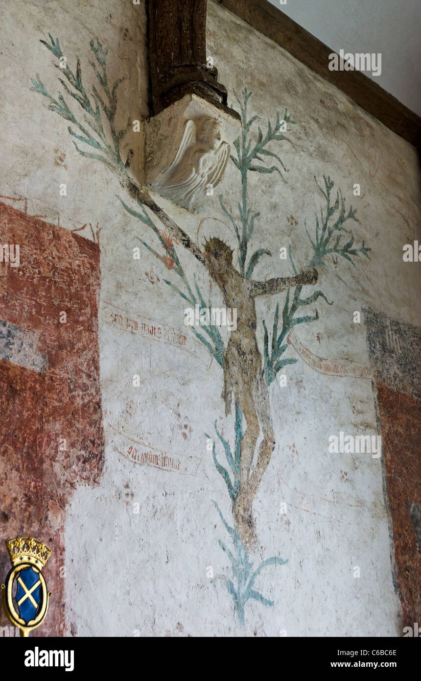 Il Giglio crocifisso. Pittura murale medioevale. Chiesa di tutti i santi, Godshill. Isola di Wight Foto Stock