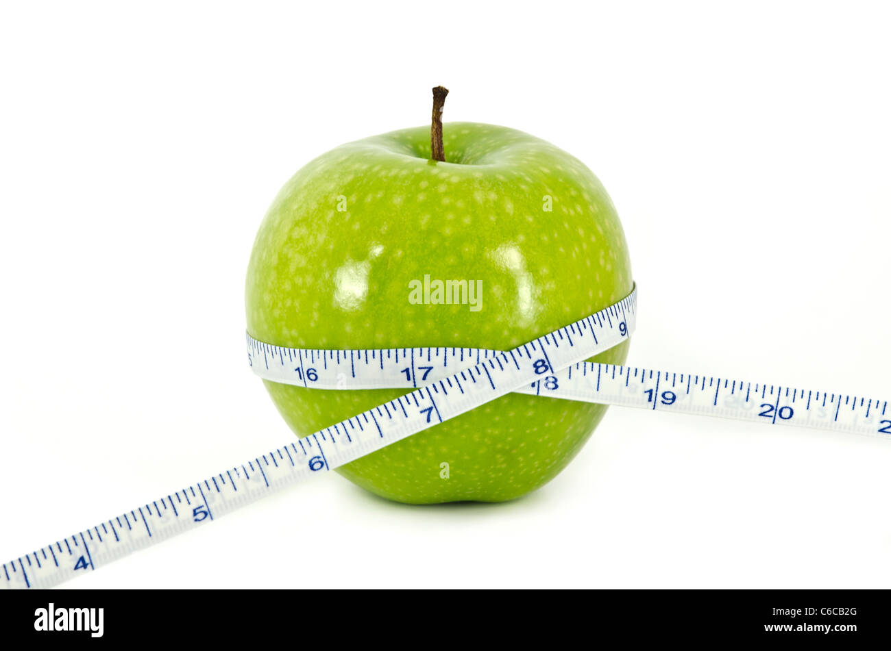 Apple e nastro di misurazione il concetto di Dieta Foto Stock