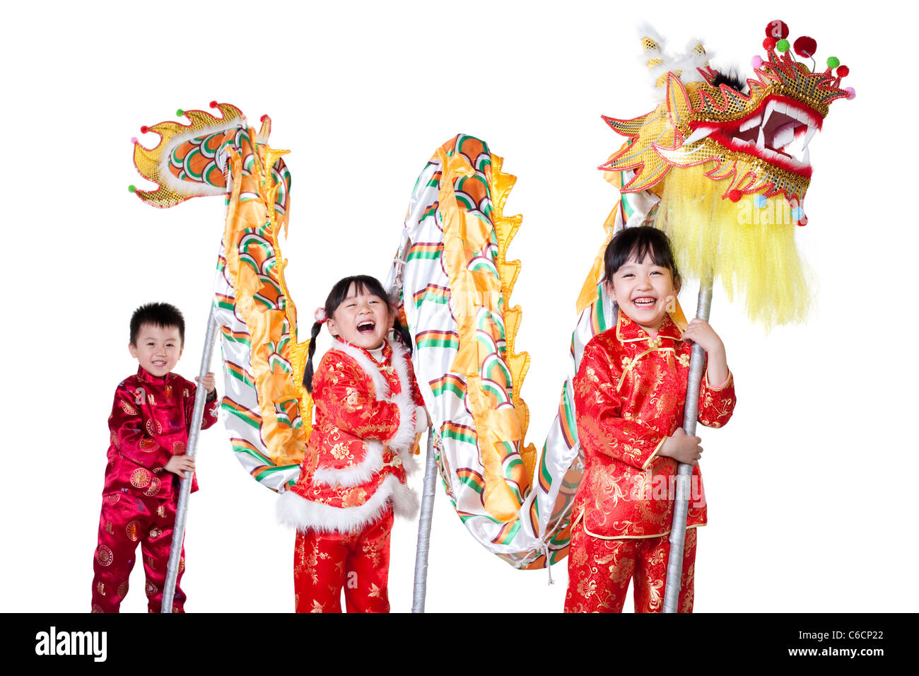 Tre bambini cinesi azienda dragone cinese Foto Stock