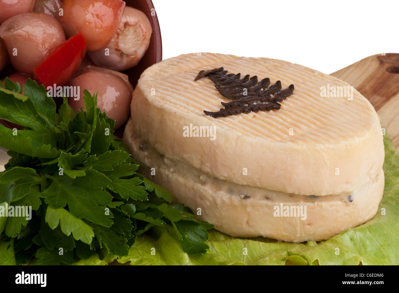 Un formaggio di capra farcita con crema di tartufo Foto Stock