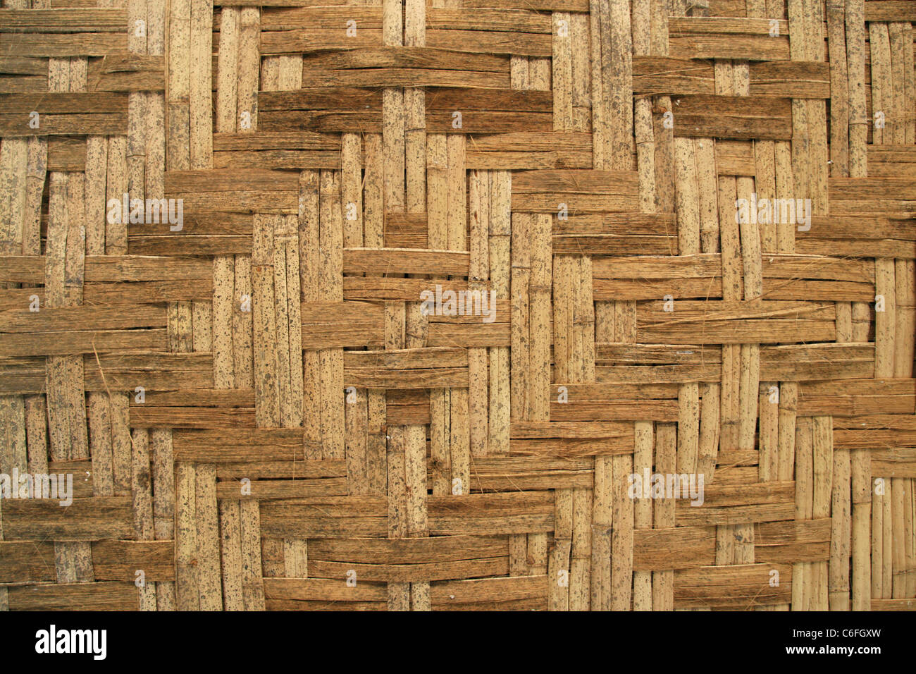 Bamboo stecche in una struttura a diamante per uso in background Foto Stock