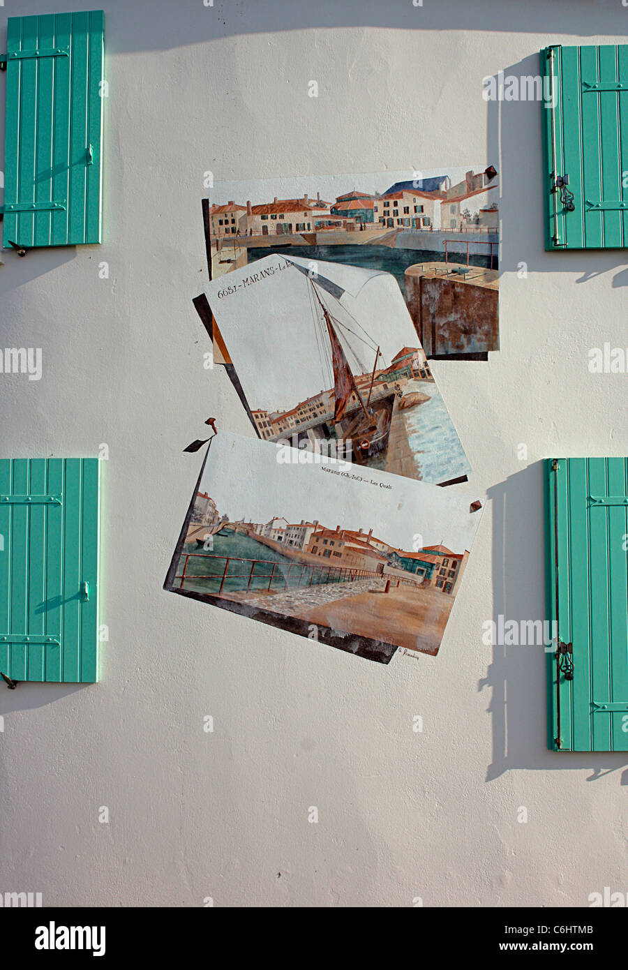 Tromp l'oeil dipinto sul muro della casa di Marans, Charente Maritime, Francia Foto Stock