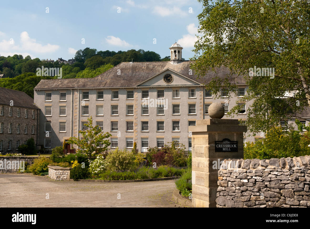 Cressbrook Mill, il Parco Nazionale di Peak District, Derbyshire, in Inghilterra. Foto Stock