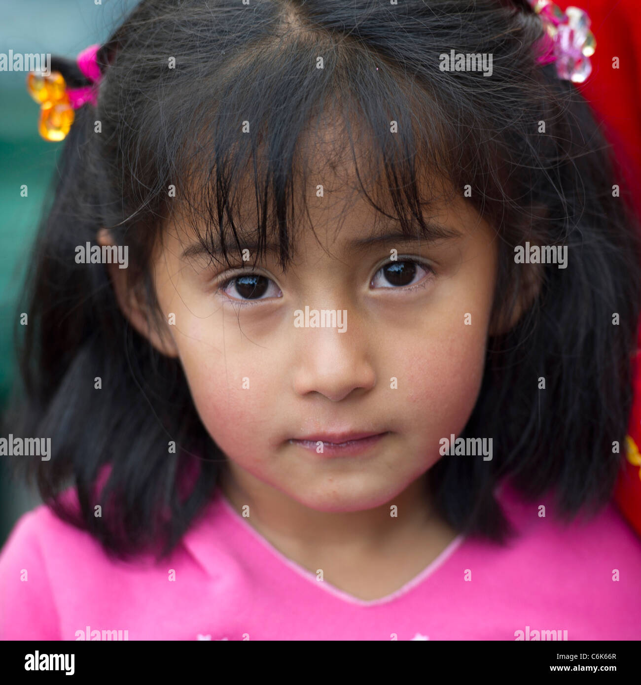 Ritratto di un Quechua ragazza indiana, Plaza Regocijo, Cuzco, Perù Foto Stock