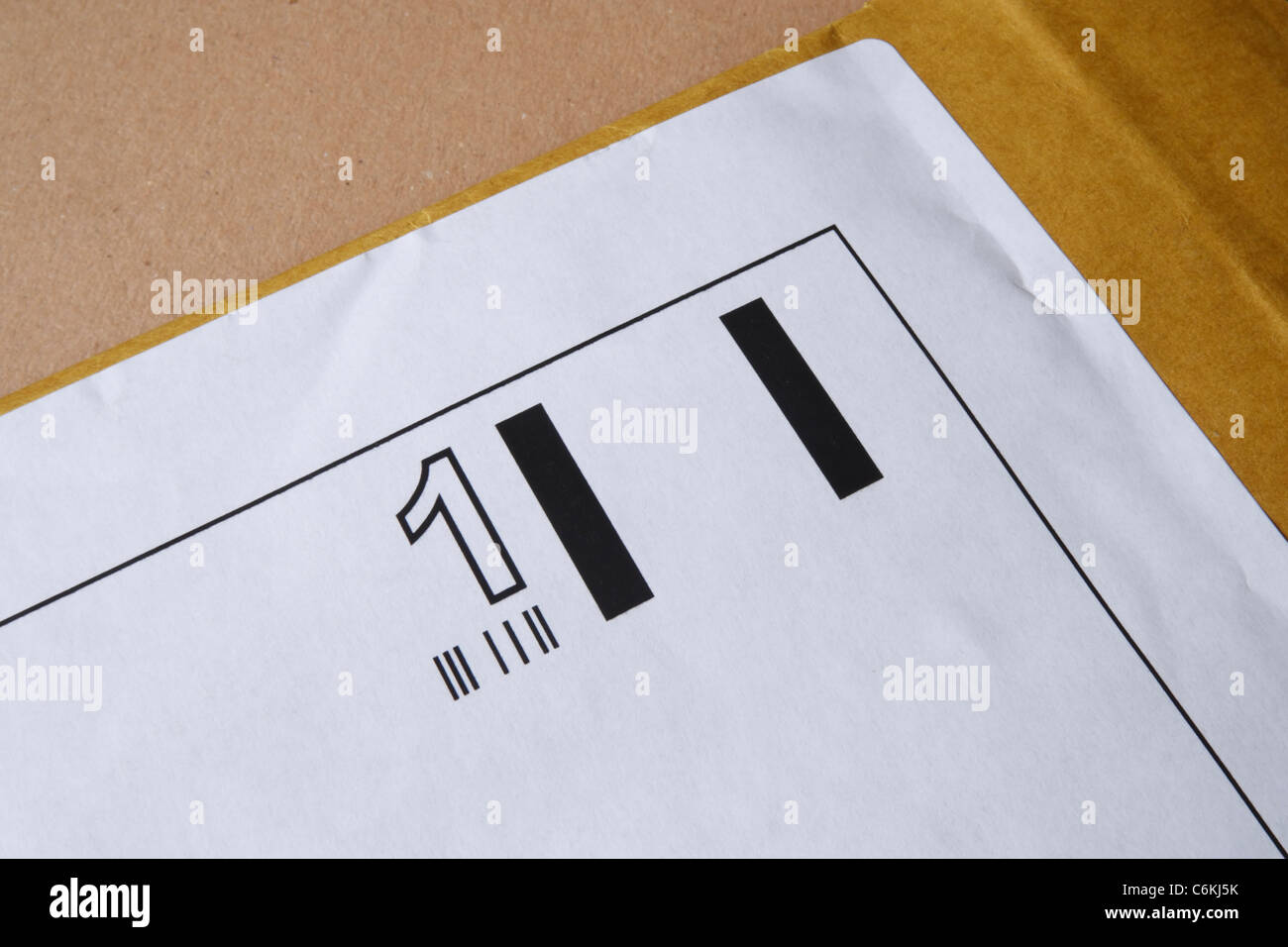 Prima Classe pre pagato business reply timbro sulla busta imbottita Foto Stock