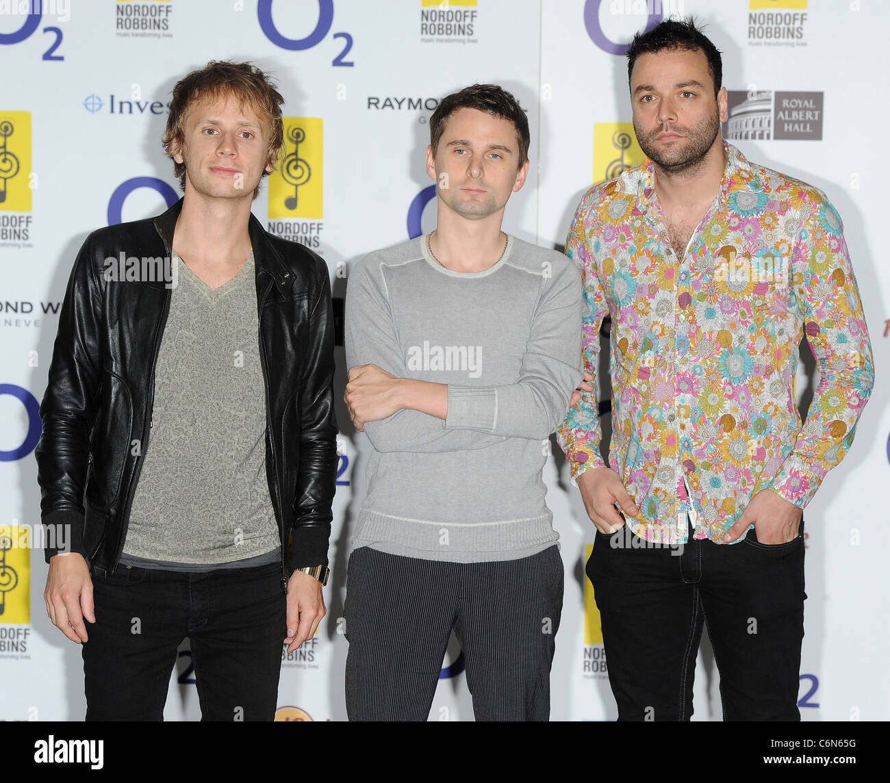 Dominic Howard, Matt Bellamy e Christopher Wolstenholme di Muse O2 Silver Clef Awards 2010 tenutosi presso il London Hilton, Parco Foto Stock