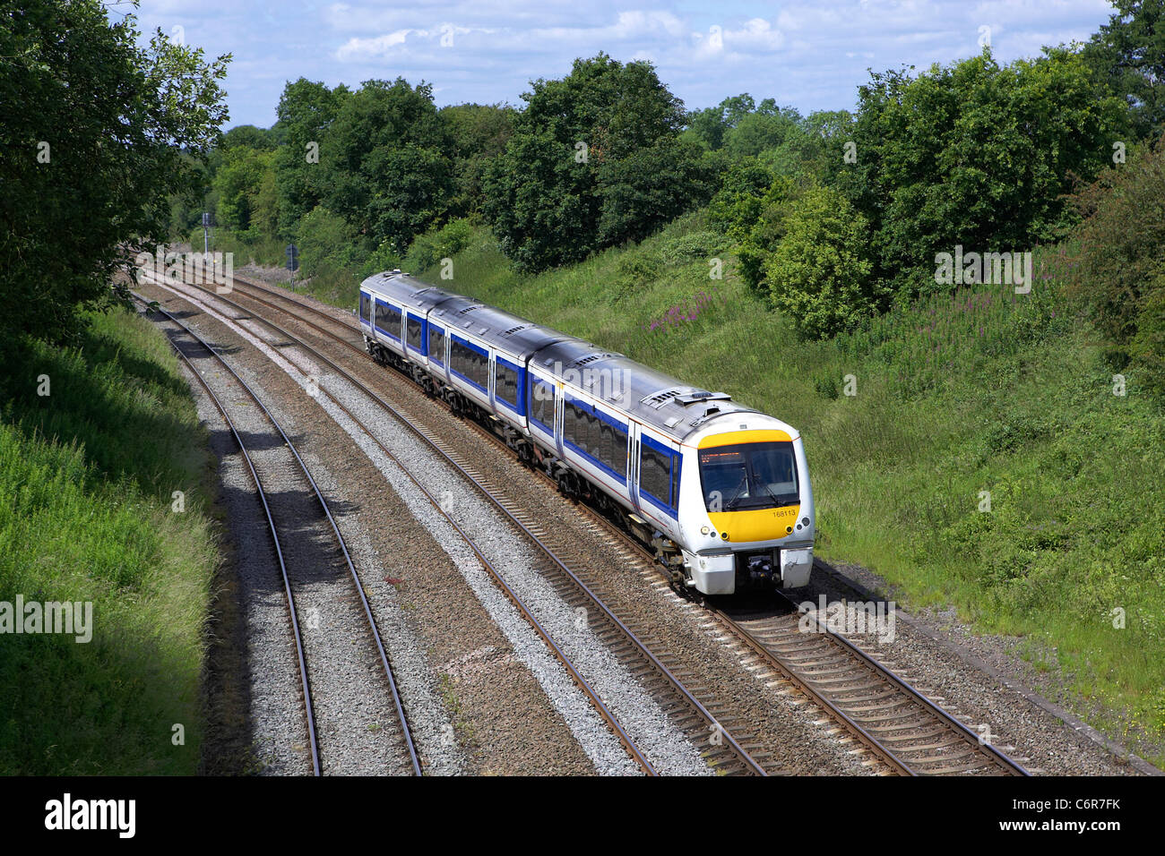 Chiltern Railways classe numero 168 168 113 passa attraverso Hatton con un Birmingham Snow Hill - London Marylebone servizio su 20-0 Foto Stock