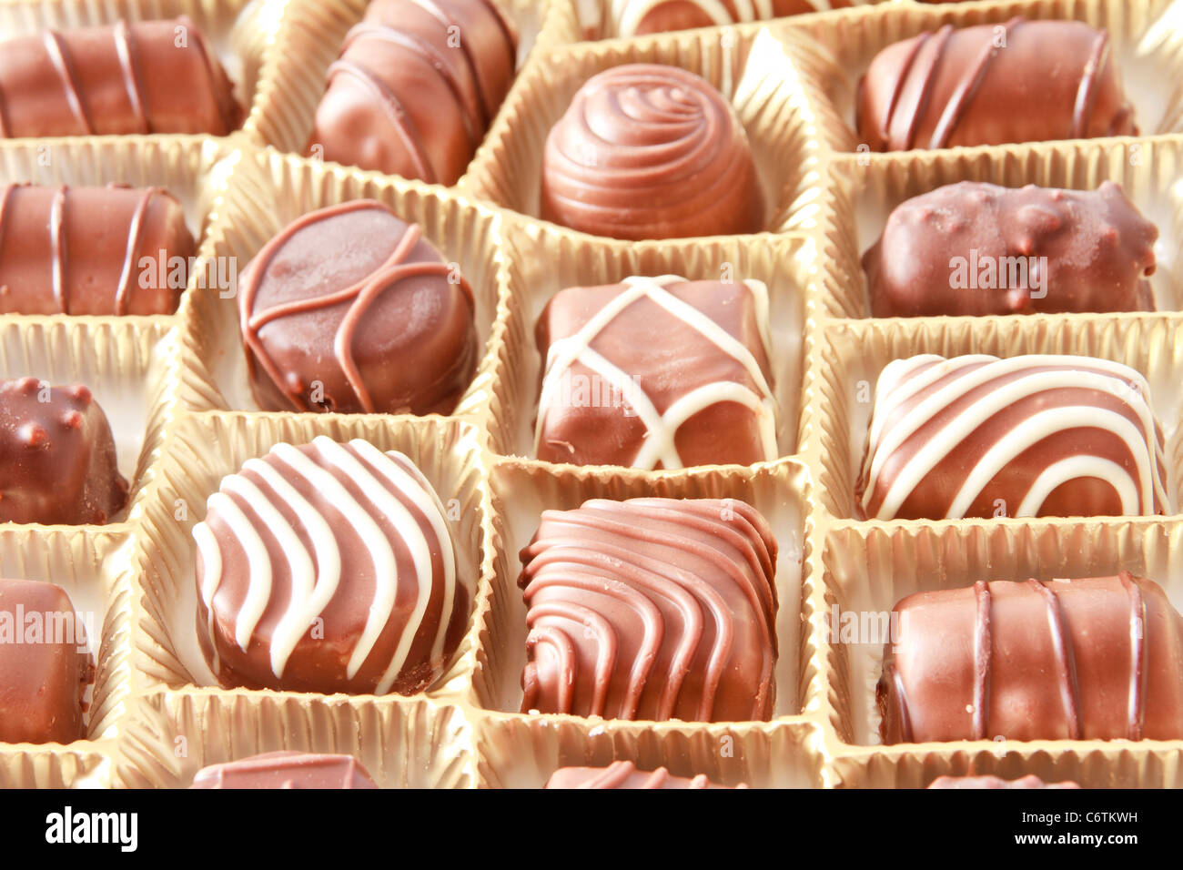Praline di cioccolato di sfondo delle caselle Foto Stock