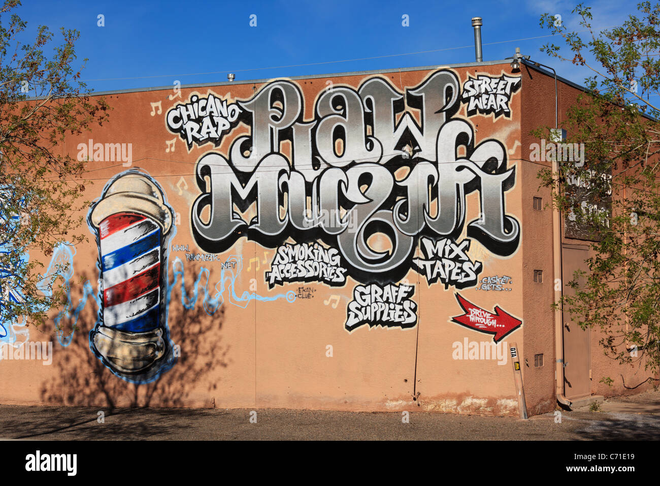 Graffiti pubblicità per materie Muzik shop di Albuquerque, Nuovo Messico. Foto Stock