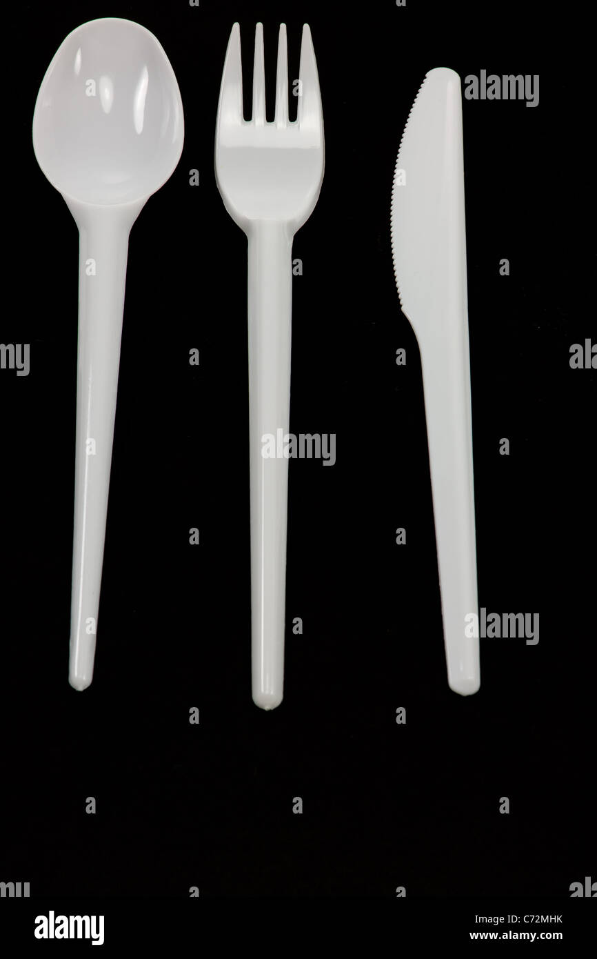 Immagine di una forcella di plastica, cucchiaio e coltello Foto Stock