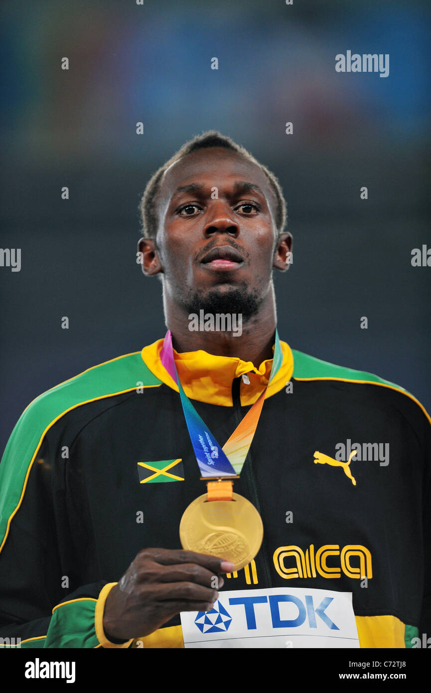 Usain Bolt (JAM) ha ottenuto una medaglia di oro durante il XIII IAAF Campionati del Mondo di atletica leggera. Foto Stock