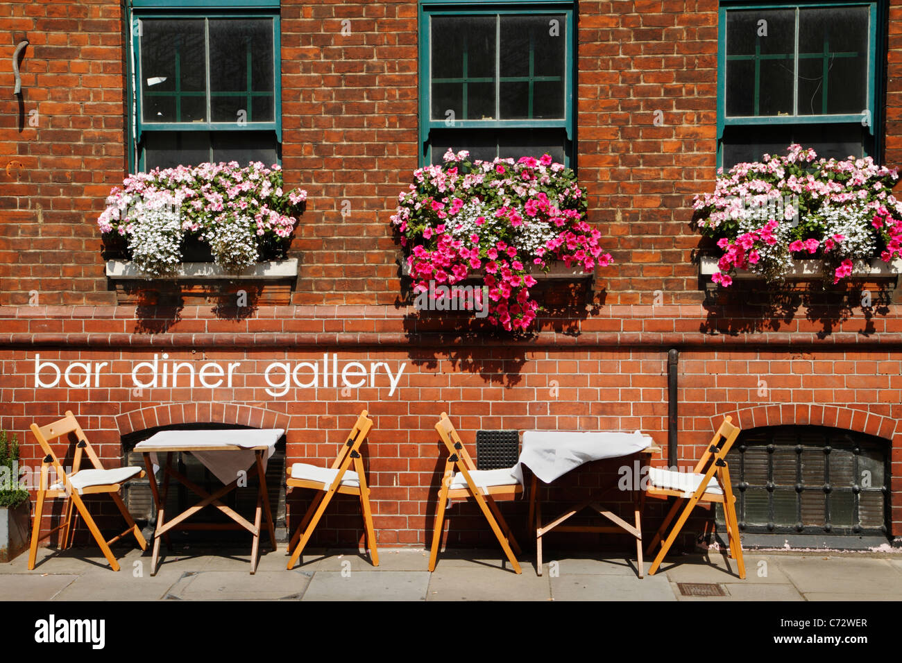 Scatole di finestra a bar & diner nel mercato di Borough, London REGNO UNITO Foto Stock