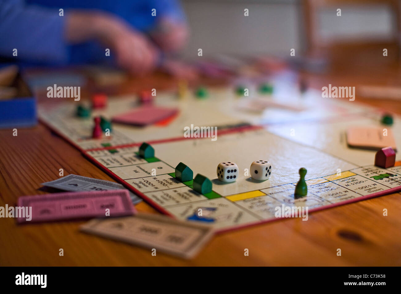 Gioco di monopoli, versione tedesca, dettaglio sfocato, il denaro di gioco, Germania Foto Stock