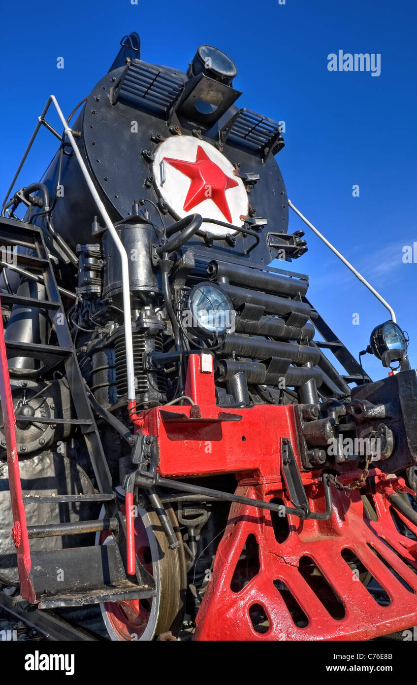 Antica locomotiva a vapore con stella rossa Foto Stock
