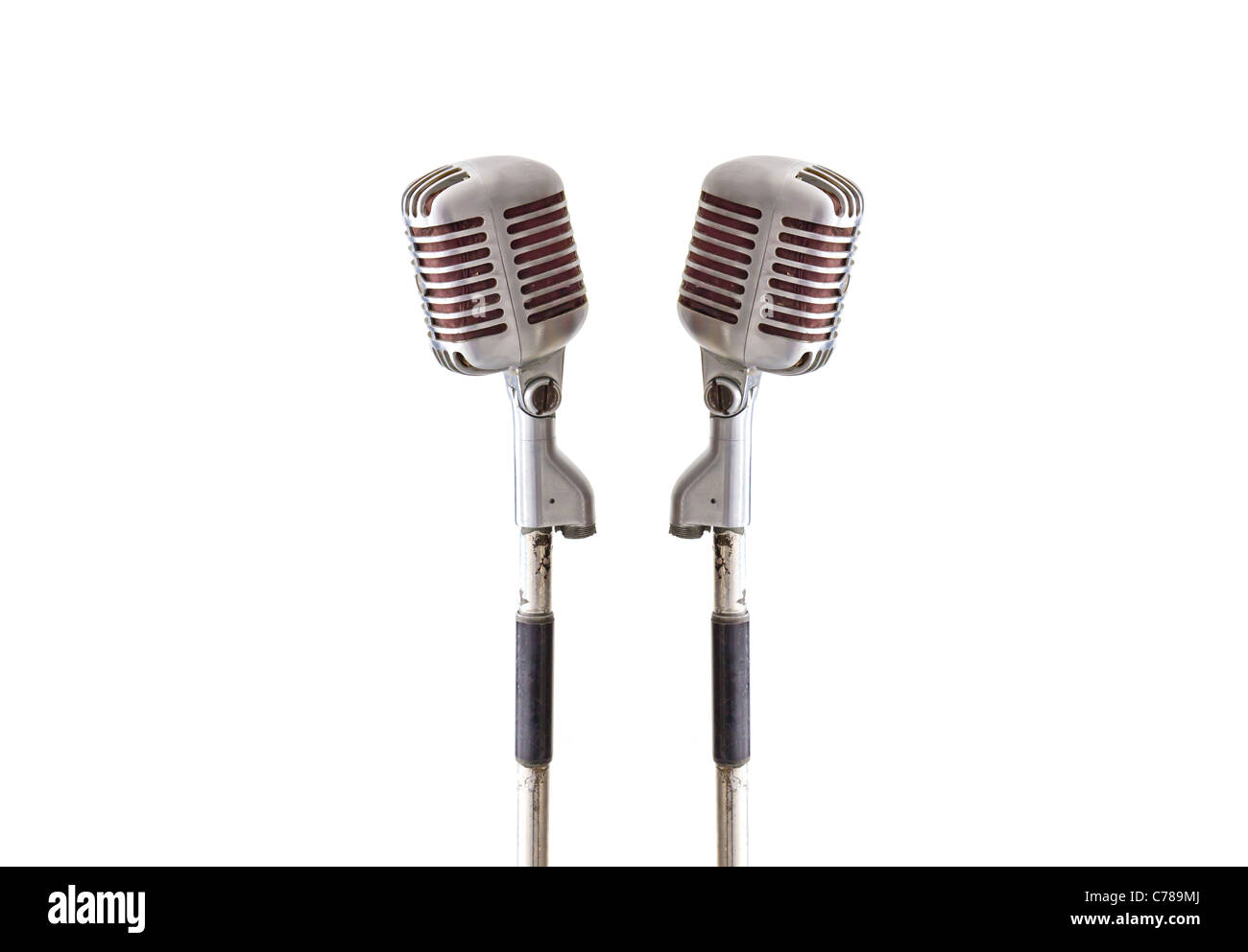 Microfono vintage isolati su sfondo bianco Foto Stock