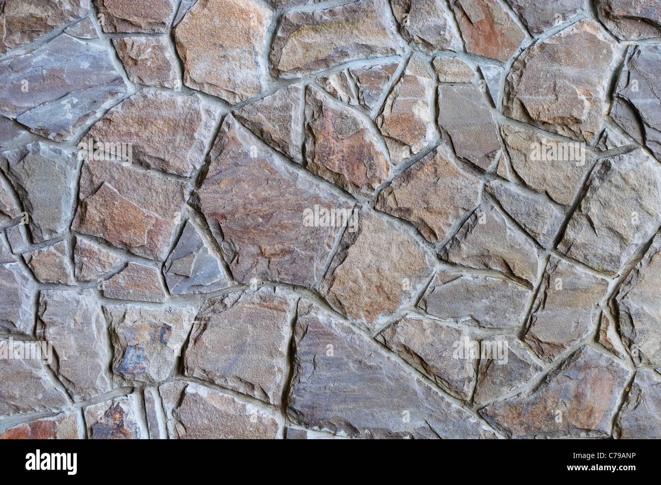 Texture di antichi muri di pietra come sfondo Foto Stock