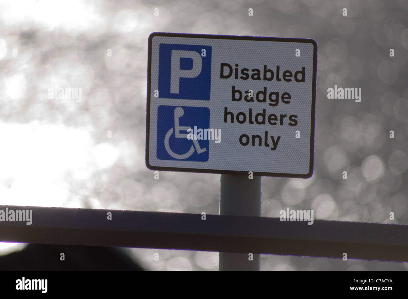 Blue badge disabili titolari simbolo di parcheggio Foto Stock