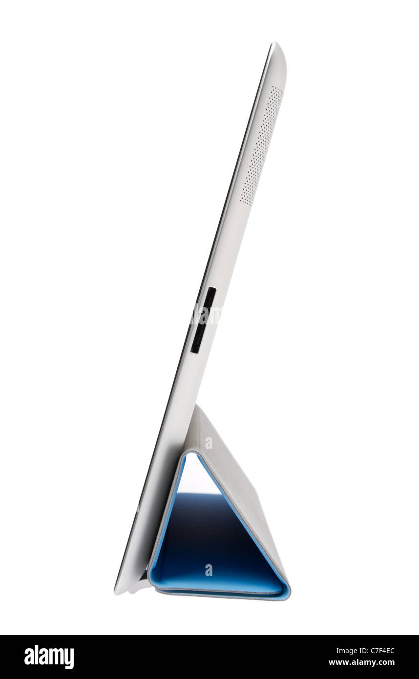 Apple Ipad2 con blu Smart cover in piedi su sfondo grigio chiaro. Foto Stock