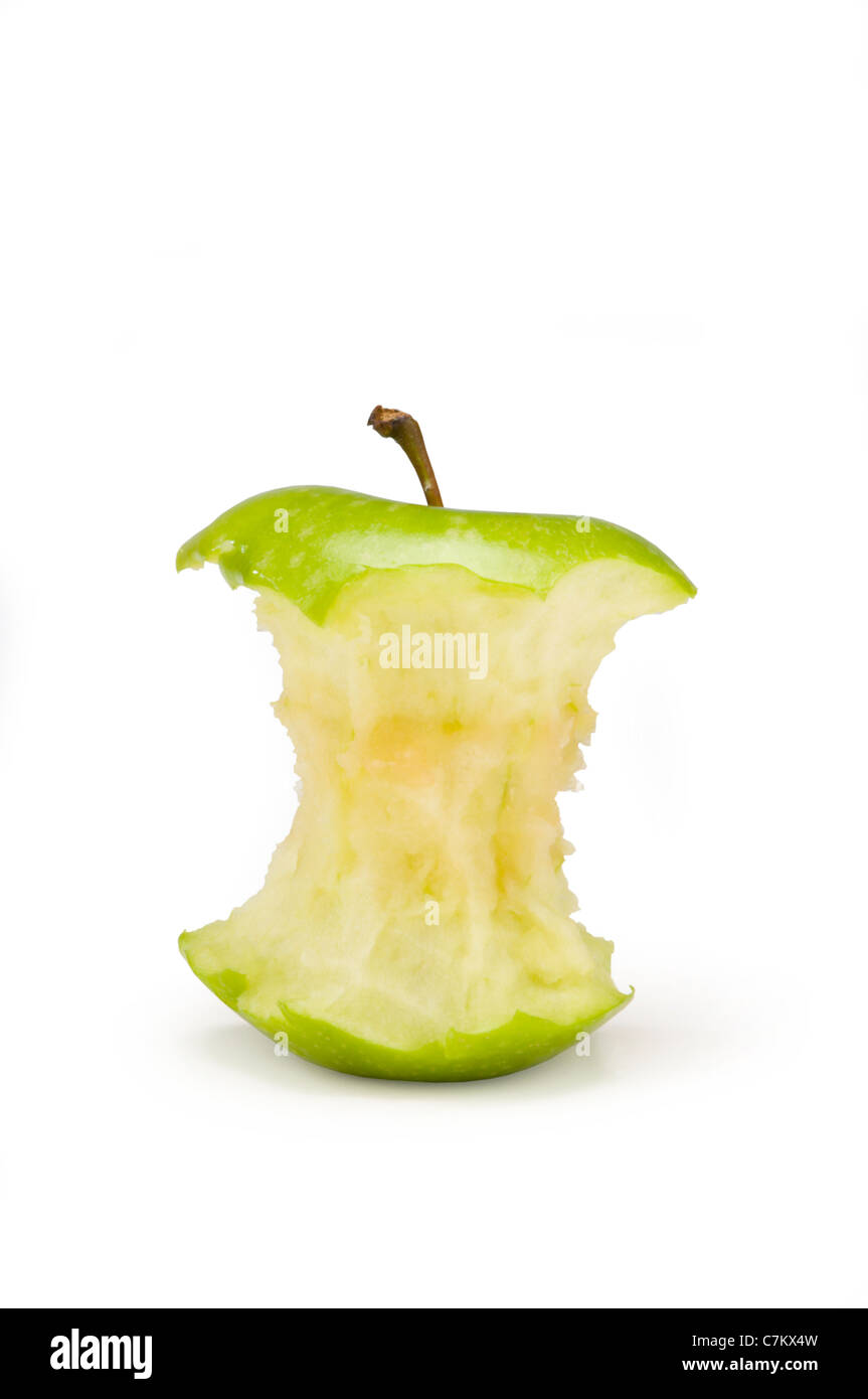 Mangiato mela verde su bianco Foto Stock