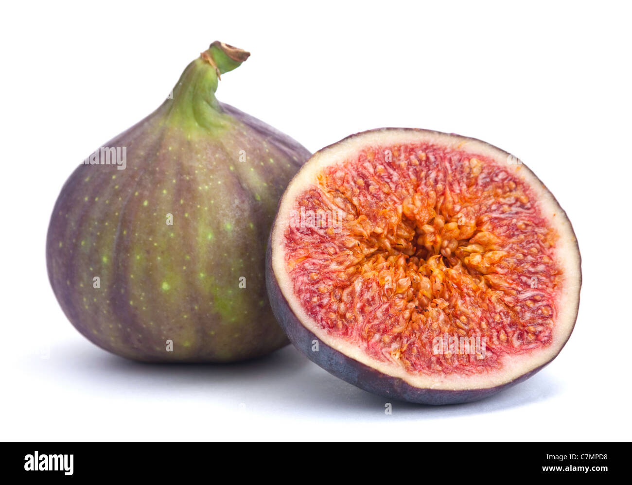 Fig frutta fresca closeup isolati su sfondo bianco Foto Stock