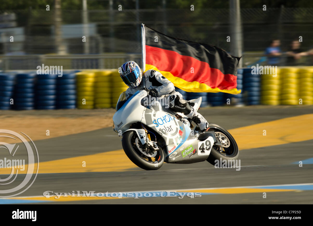 Matthias Himmelmann sul ciclomotore elettrico #99, vince l'e-Power Campionato Mondiale e il campionato TTXGP. Foto Stock