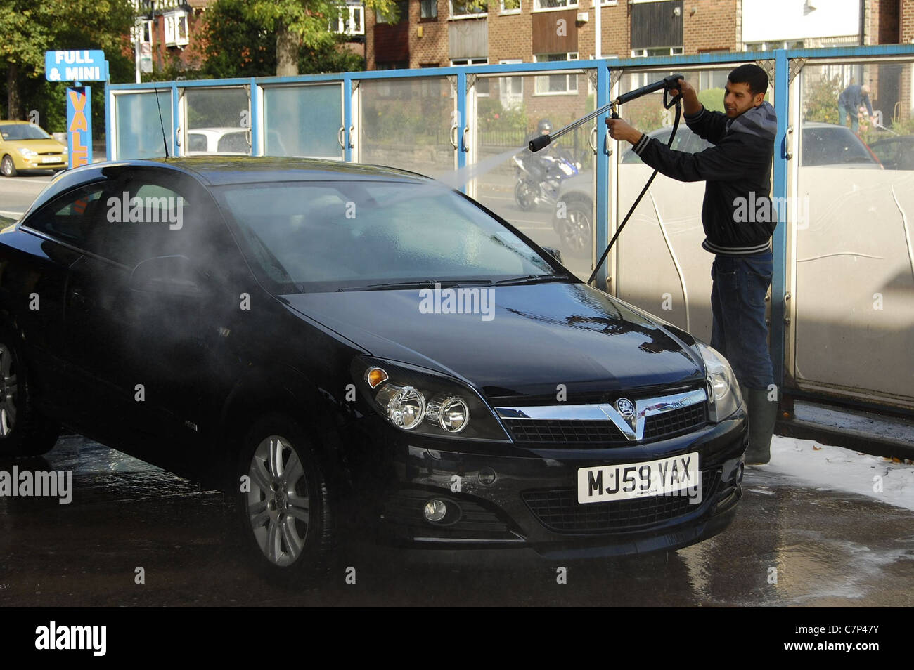 La spruzzatura ad alta pressione con un lancia Foto Stock