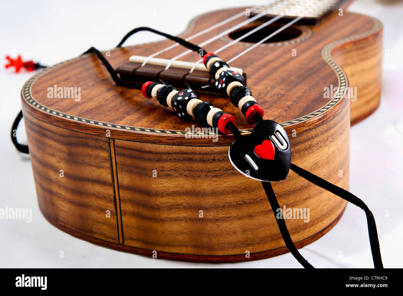Un ukulele con I Love U cinturino Foto Stock
