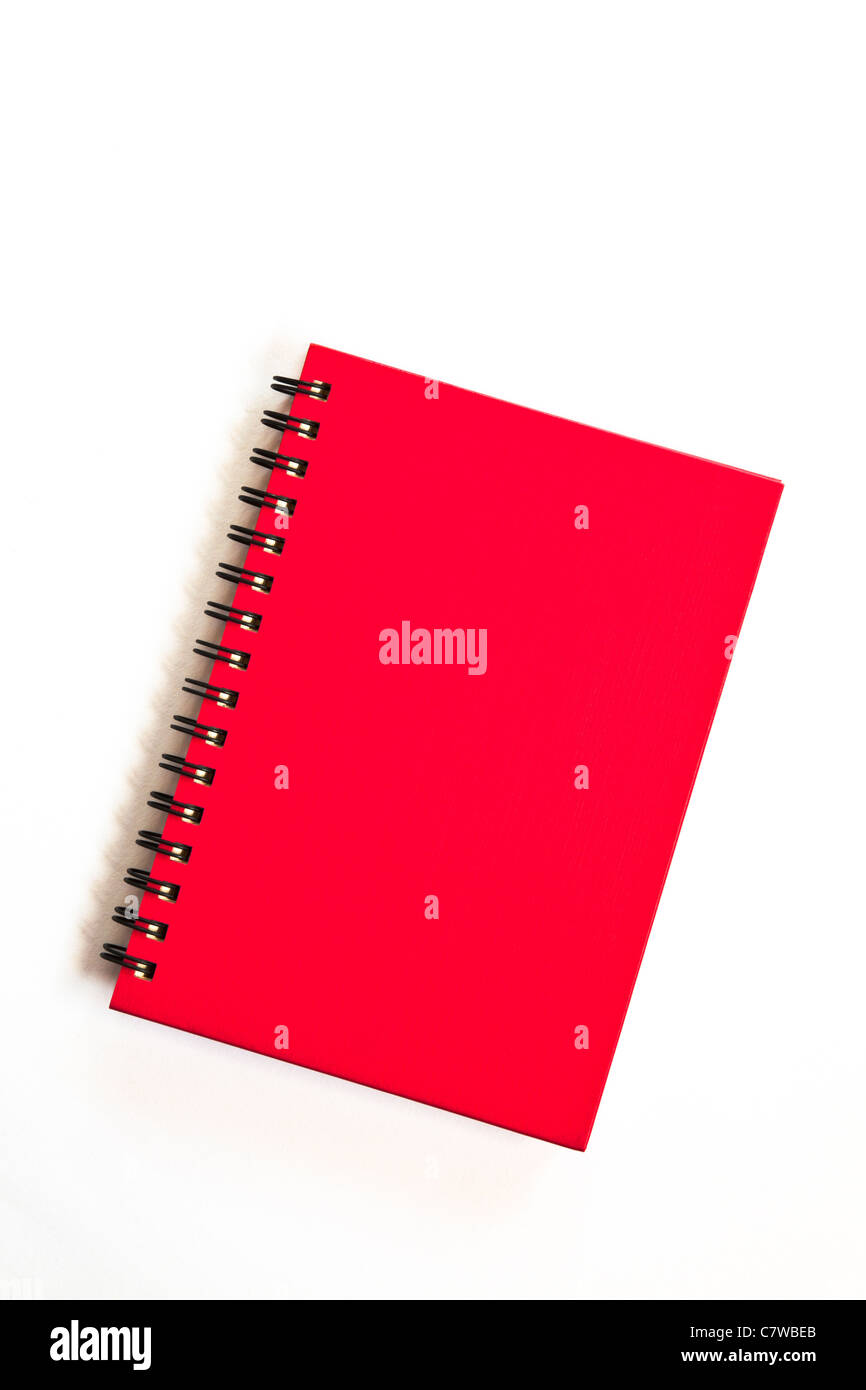 Notebook rosso su sfondo bianco Foto Stock