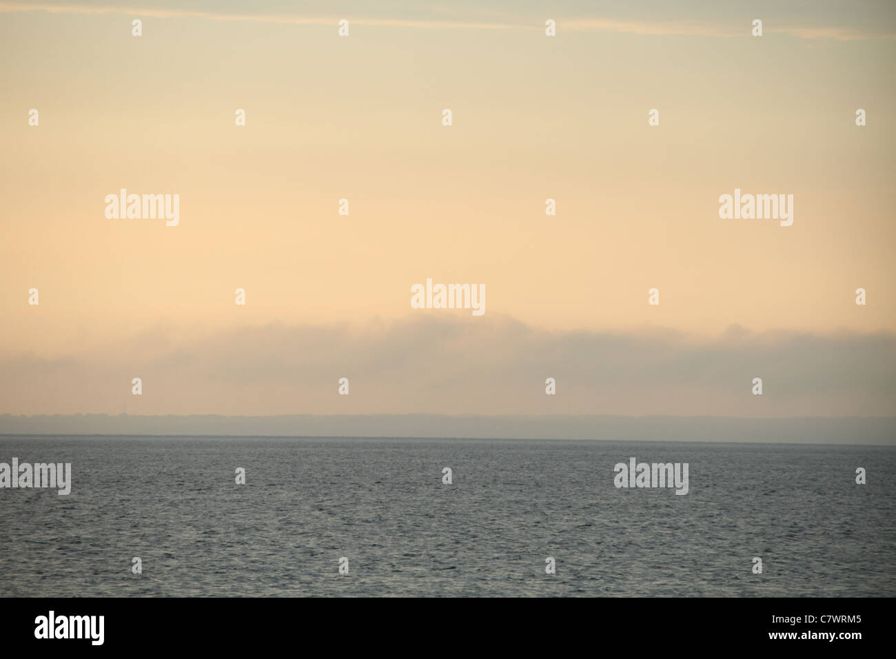 Vista del tramonto della terraferma nuvole oceano sky scenic ocean Foto Stock