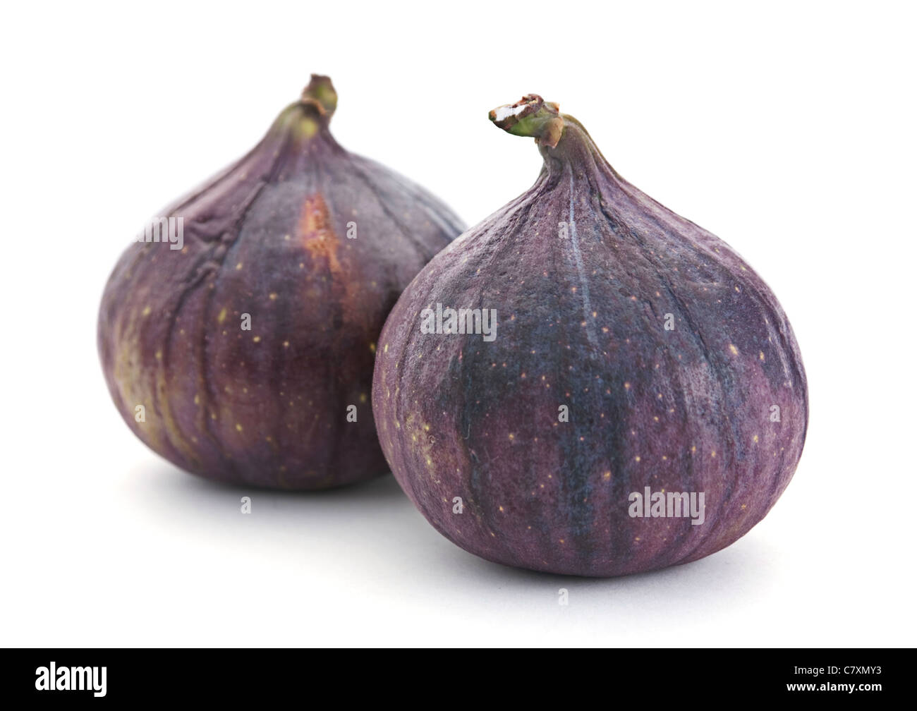 Fig frutta fresca closeup isolati su sfondo bianco Foto Stock