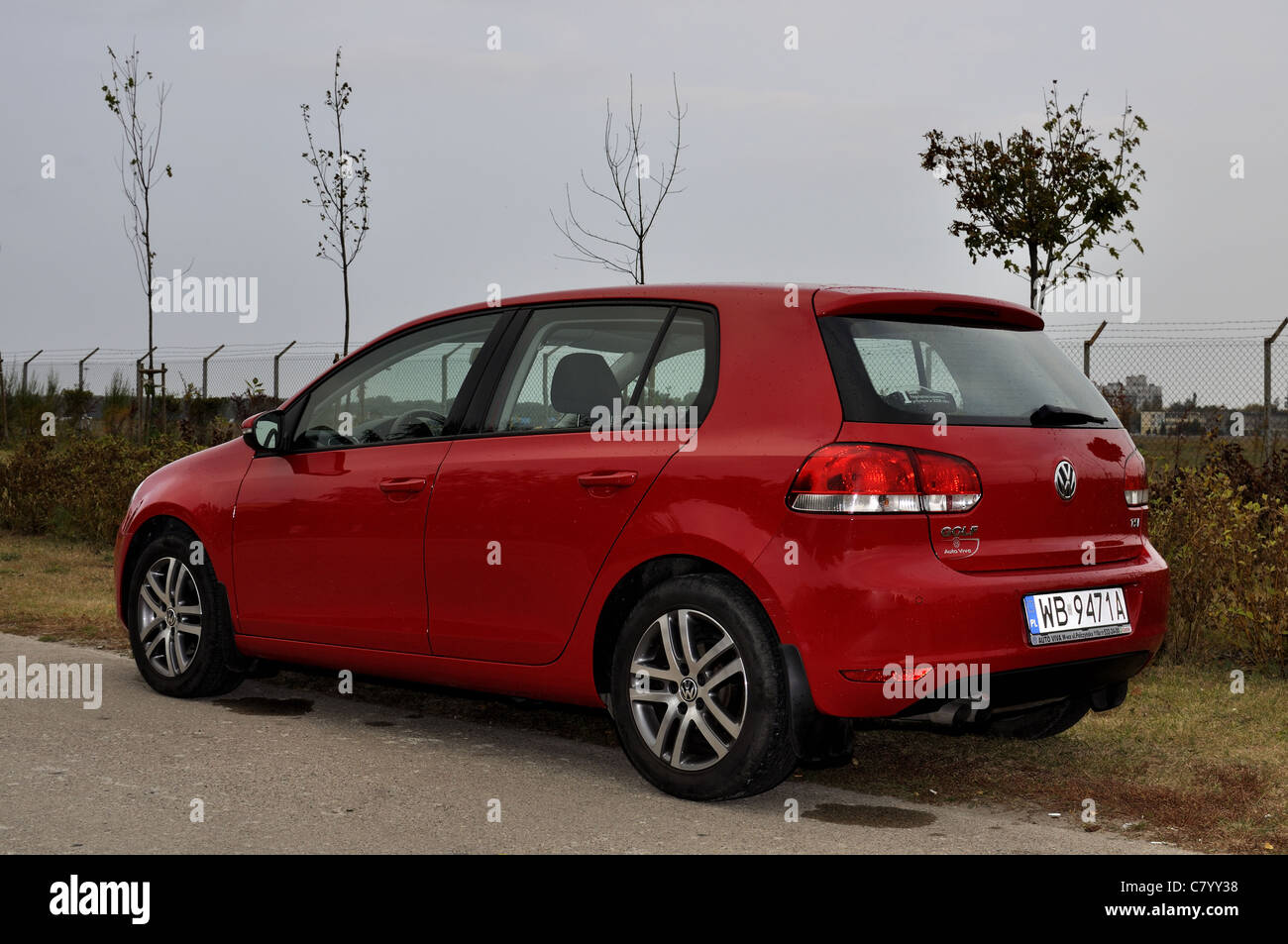 Volkswagen Golf VI 1.4 STI - il mio 2009 - Rosso metalizzato - Tedesco popolare auto compatta, segmento C, classe medio-inferiore Foto Stock