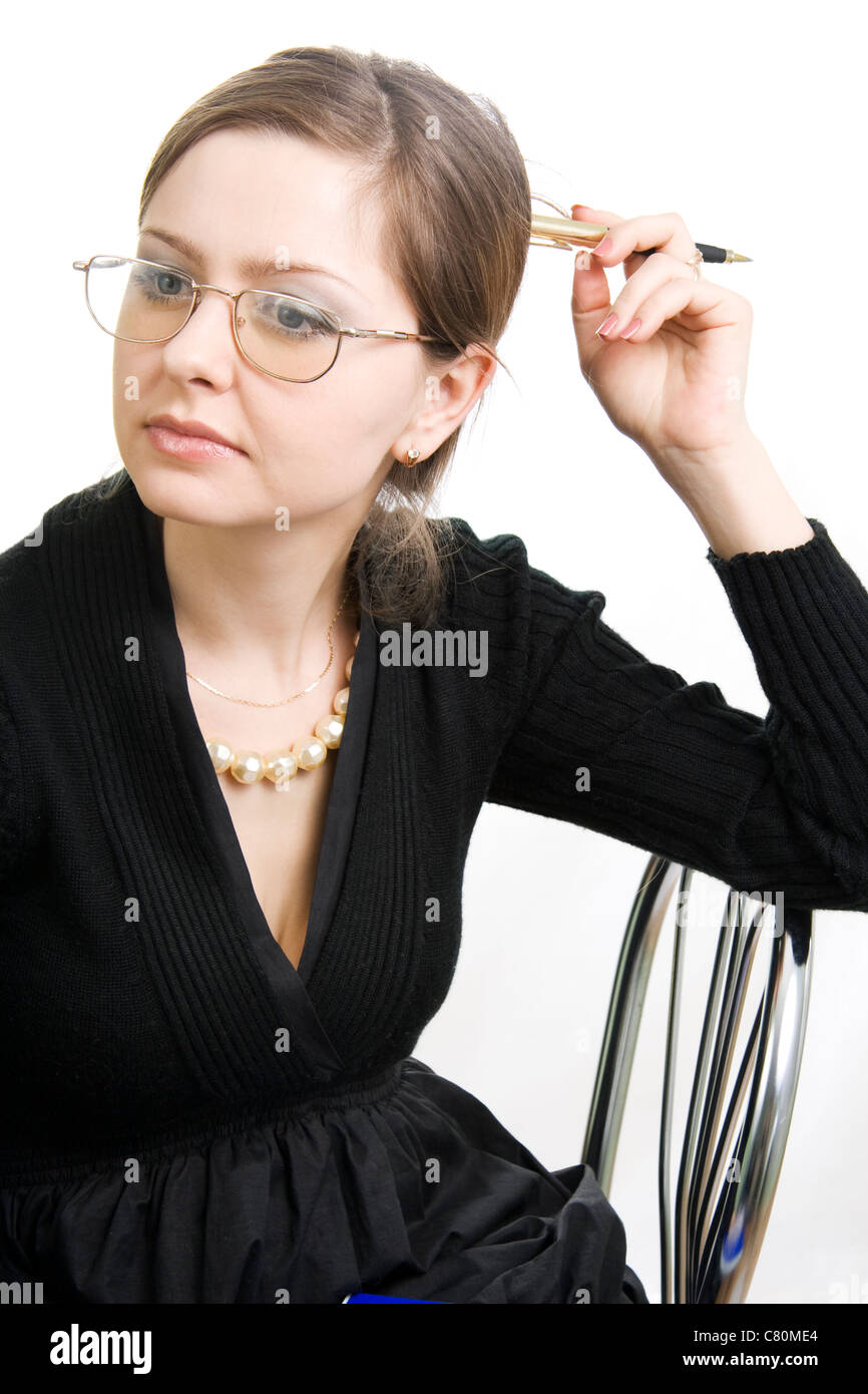 Insegnante o imprenditrice un abito nero. Sfondo bianco. Foto Stock